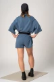 Kurzer Jumpsuit für Damen in Blau Ganzkörperansicht von hinten